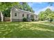 Lovely home showcasing lush green lawn, complemented by well-maintained landscaping and inviting curb appeal at 1301 Eastridge Sw Rd, Atlanta, GA 30311