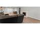 Spacious living room featuring modern flooring, a fireplace, and ample space for furniture arrangement at 1301 Eastridge Sw Rd, Atlanta, GA 30311