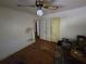 Bedroom featuring hardwood floors, neutral walls, and two white doors at 25 Candler Se Rd, Atlanta, GA 30317