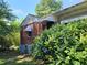 View of the back exterior elevation with brick construction at 25 Candler Se Rd, Atlanta, GA 30317