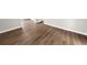 A close-up of the beautiful, wood-look flooring in a home's neutral-colored room at 2923 Akron St, East Point, GA 30344
