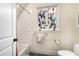 Bathroom with a colorful tiled floor and stained glass window at 927 Berkshire Ne Rd, Atlanta, GA 30324