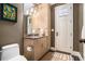 Charming bathroom with double vanity and updated fixtures, complimented by warm paint tones at 927 Berkshire Ne Rd, Atlanta, GA 30324