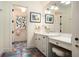 Bathroom featuring a colorful tiled floor and stained glass window at 927 Berkshire Ne Rd, Atlanta, GA 30324