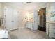 Spacious bathroom with double doors, vanity, and tiled flooring at 927 Berkshire Ne Rd, Atlanta, GA 30324