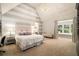 Bedroom with a large bed, neutral carpet, and a window seat at 927 Berkshire Ne Rd, Atlanta, GA 30324