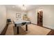 Spacious game room featuring an air hockey table and vintage pinball machine with neutral color scheme at 927 Berkshire Ne Rd, Atlanta, GA 30324