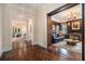 Hallway with dark herringbone hardwood floors and archways opening to multiple rooms at 927 Berkshire Ne Rd, Atlanta, GA 30324