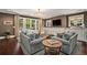 Spacious living room with french doors that open to the backyard pool and patio area at 927 Berkshire Ne Rd, Atlanta, GA 30324
