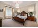 Comfortable main bedroom with elegant furnishings and soft, neutral tones at 927 Berkshire Ne Rd, Atlanta, GA 30324