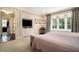 Spacious bedroom featuring built-in storage, large windows, and soothing colors create a relaxing environment at 927 Berkshire Ne Rd, Atlanta, GA 30324