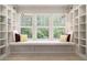 Cozy window seat with built-in bookshelves at 927 Berkshire Ne Rd, Atlanta, GA 30324