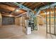 Unfinished basement featuring exposed ductwork and framing with a dehumidifier at 1010 Graystone Xing, Alpharetta, GA 30005