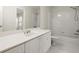 Bathroom featuring vanity with sink, tub and shower combo, and toilet at 1010 Graystone Xing, Alpharetta, GA 30005