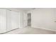 Bright bedroom with carpet flooring and double door closet at 1010 Graystone Xing, Alpharetta, GA 30005