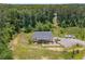 Birds eye view of home and surrounding area showing the driveway and landscaping at 212 Postell Rd, Dallas, GA 30157