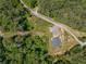 Aerial view of a secluded property surrounded by lush green trees at 212 Postell Rd, Dallas, GA 30157