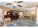 Finished basement with a full bar area, dark wood accents, and ample room for seating, perfect for gatherings at 212 Postell Rd, Dallas, GA 30157