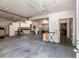 Spacious basement with concrete floor and partial kitchen at 212 Postell Rd, Dallas, GA 30157