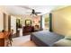 Bright bedroom with natural light and a well-appointed dresser and desk offering a tranquil retreat at 212 Postell Rd, Dallas, GA 30157