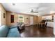 Inviting living room with laminate flooring, natural light, and a ceiling fan at 212 Postell Rd, Dallas, GA 30157