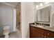 Bathroom with granite vanity, tile shower and floors, plus brushed-nickel fixtures at 2277 Peachtree Ne Rd # 611, Atlanta, GA 30309