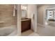 Primary bathroom includes a granite vanity, tile shower and floors adjacent to main bedroom at 2277 Peachtree Ne Rd # 611, Atlanta, GA 30309