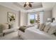 Serene bedroom with large windows, ceiling fan, and comfortable bedding, offering city views at 2277 Peachtree Ne Rd # 611, Atlanta, GA 30309