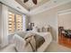 Cozy bedroom with a ceiling fan and a door leading to a dining area at 2277 Peachtree Ne Rd # 611, Atlanta, GA 30309