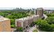 Aerial view of the building exterior showcasing well-manicured landscaping and city views at 2277 Peachtree Ne Rd # 611, Atlanta, GA 30309