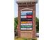 Peachtree Square brick sign featuring business listings like ChopShop, Florist and Supercuts at 2277 Peachtree Ne Rd # 611, Atlanta, GA 30309