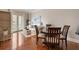 Inviting living and dining area with hardwood floors and a view to the outside balcony at 2277 Peachtree Ne Rd # 611, Atlanta, GA 30309