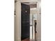 A view of the unit's front door and the hardwood flooring throughout the unit's interior at 2277 Peachtree Ne Rd # 611, Atlanta, GA 30309