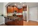 Well-appointed kitchen boasting granite countertops, stainless steel appliances, and rich wood cabinetry at 2277 Peachtree Ne Rd # 611, Atlanta, GA 30309