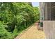 Serene pathway lined with lush greenery, offering a peaceful escape right outside your door at 2277 Peachtree Ne Rd # 611, Atlanta, GA 30309