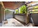 The private patio offers a secluded outdoor space with unique architectural details at 3091 Colonial Way # I2, Atlanta, GA 30341