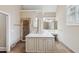 Bathroom featuring double sinks, a vanity area, and a walk-in shower with tile surround at 4217 Wieuca Overlook Ne, Atlanta, GA 30342