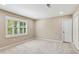 Spacious bedroom with wall to wall carpeting, a window, and a closet for ample storage at 4217 Wieuca Overlook Ne, Atlanta, GA 30342