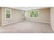 Spacious bedroom featuring neutral walls, carpet floors and large windows with natural light at 4217 Wieuca Overlook Ne, Atlanta, GA 30342