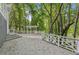 Large wooden deck with surrounding trees and lush landscape creating a relaxing atmosphere at 4217 Wieuca Overlook Ne, Atlanta, GA 30342