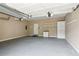 Spacious garage with shelving, storage and gray flooring, offering practical organization at 4217 Wieuca Overlook Ne, Atlanta, GA 30342