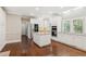 Spacious kitchen featuring white cabinets, stainless steel appliances, and center island at 4217 Wieuca Overlook Ne, Atlanta, GA 30342