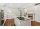 Bright kitchen features white cabinets, stainless steel appliances, and granite island at 4217 Wieuca Overlook Ne, Atlanta, GA 30342