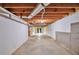 Unfinished basement with concrete floor, exposed ductwork, and block walls at 616 Lone Oak Ct, Lithonia, GA 30058