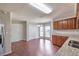 Kitchen and breakfast nook with wood floors, granite countertops and a bay window that provides ample natural light at 616 Lone Oak Ct, Lithonia, GA 30058