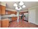 Spacious kitchen with stainless steel appliances, granite countertops and wood cabinets, ideal for cooking and entertaining at 616 Lone Oak Ct, Lithonia, GA 30058