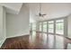 Spacious living room featuring vaulted ceilings and an abundance of natural light, perfect for gatherings at 616 Lone Oak Ct, Lithonia, GA 30058
