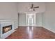 Comfortable living room featuring a fireplace, and an inviting entrance that flows to an open-concept layout at 616 Lone Oak Ct, Lithonia, GA 30058