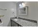 Modern bathroom with granite countertops, updated fixtures, and neutral decor at 1358 Millstream Trl, Lawrenceville, GA 30044