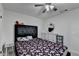 Cozy bedroom featuring a plush bed, stylish headboard, and complementary decor at 1358 Millstream Trl, Lawrenceville, GA 30044